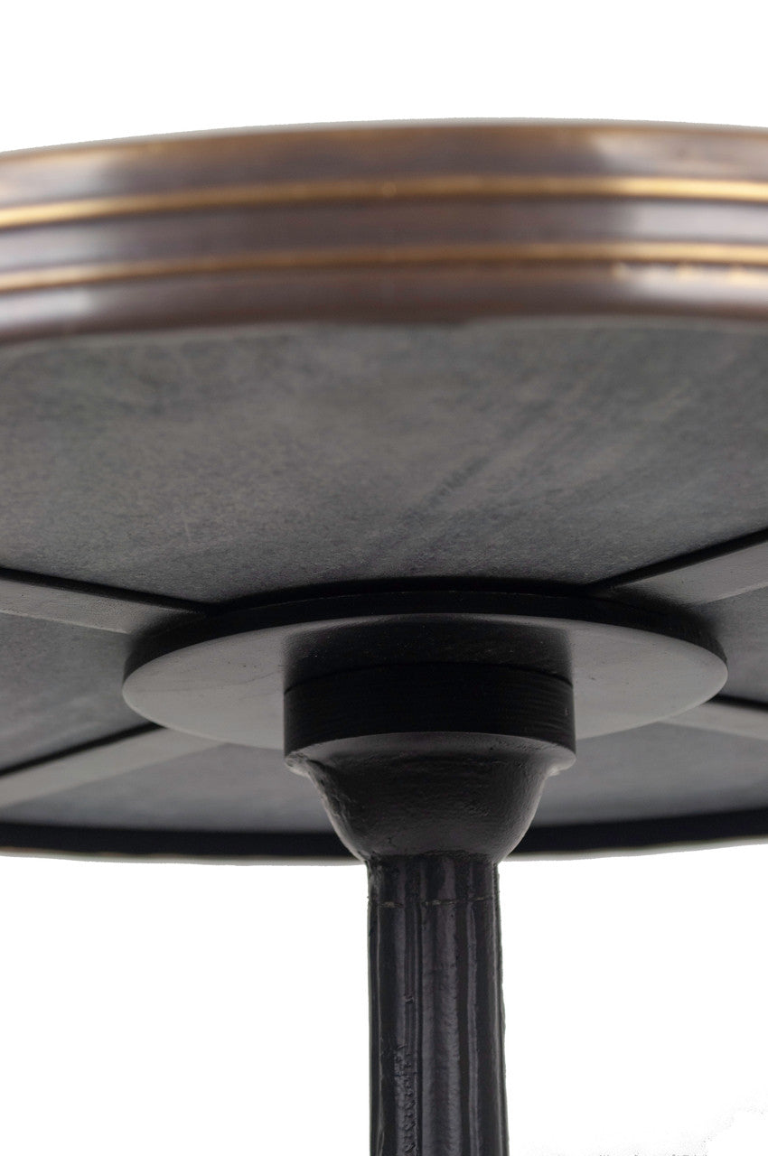 closeup marble bistro table brass rim