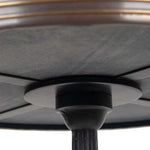 closeup marble bistro table brass rim